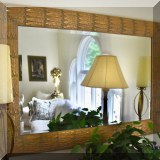 DM01. Windsor Art & Mirror Co. beveled glass mirror with feather design on border. 32.5”h x 44.5”w